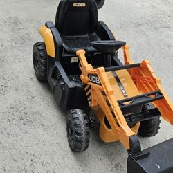 24 volt  tractor w backhoe