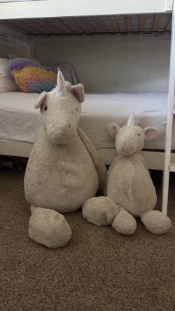 Jellycat unicorns. Extra large and medium