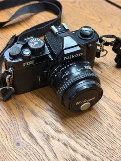 Nikon FM2n film camera with 50mm f/1.8 AF Nikkor lens