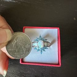 925 Sterling Silver, Opals and Genuine blue Topaz w/ Diamond accents . Tested in photos , size 7.25, marked PstarM 925, Beautiful