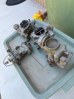 Vintage single and 2 barrel carburetors and 2 fuel pumps