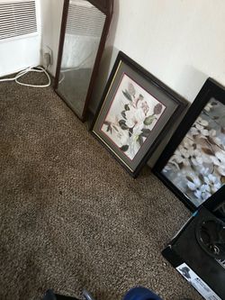 Two mirrors and two 2 flower portraits