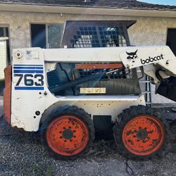 Bob Cat With 3 Attachments