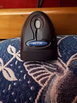 Netum NT-1698W is a versatile 2-in-1 handheld 1D laser barcode scanner. It offers flexible connectivity via a 2.4G USB wireless dongle or a wired USB