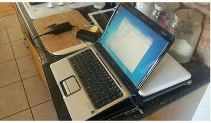 hp Dv2000 14" laptop 1.83ghz/2gb/250gb/webcam/dvdrw/sd card slot/excellent