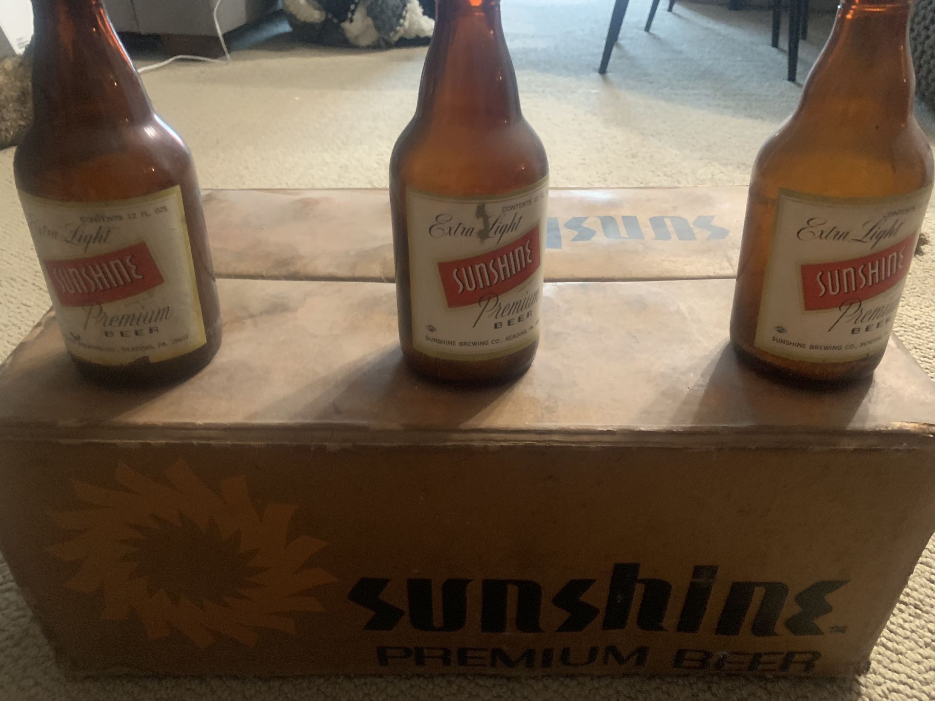 Sunshine Beer Case And Empty Bottles