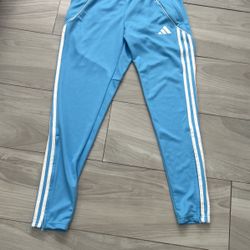 light blue adidas track pants