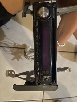 Kenwood KDC-MP208 car stereo receiver.