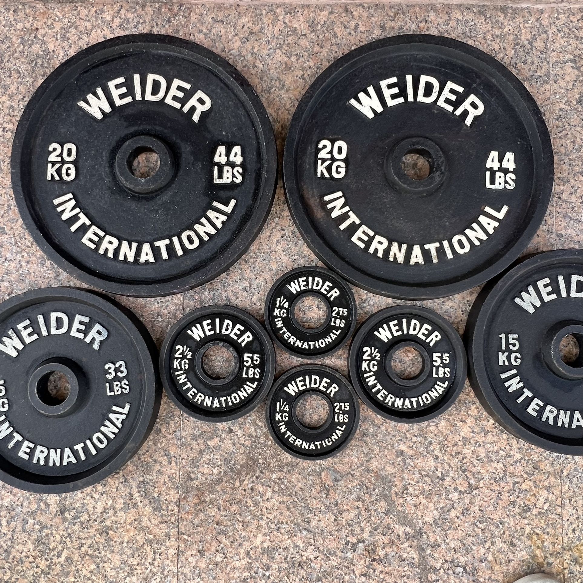 170.5 Pounds Olympic Weight Lifting Plates …Can Be sold Individual Pairs..