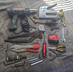 Mixture of verious tools. Maxx heat gun, Milwaukee 25ft magnetic wide Tape measure(like new), staple gun, soldering iron, vice grip, chanel lock and v