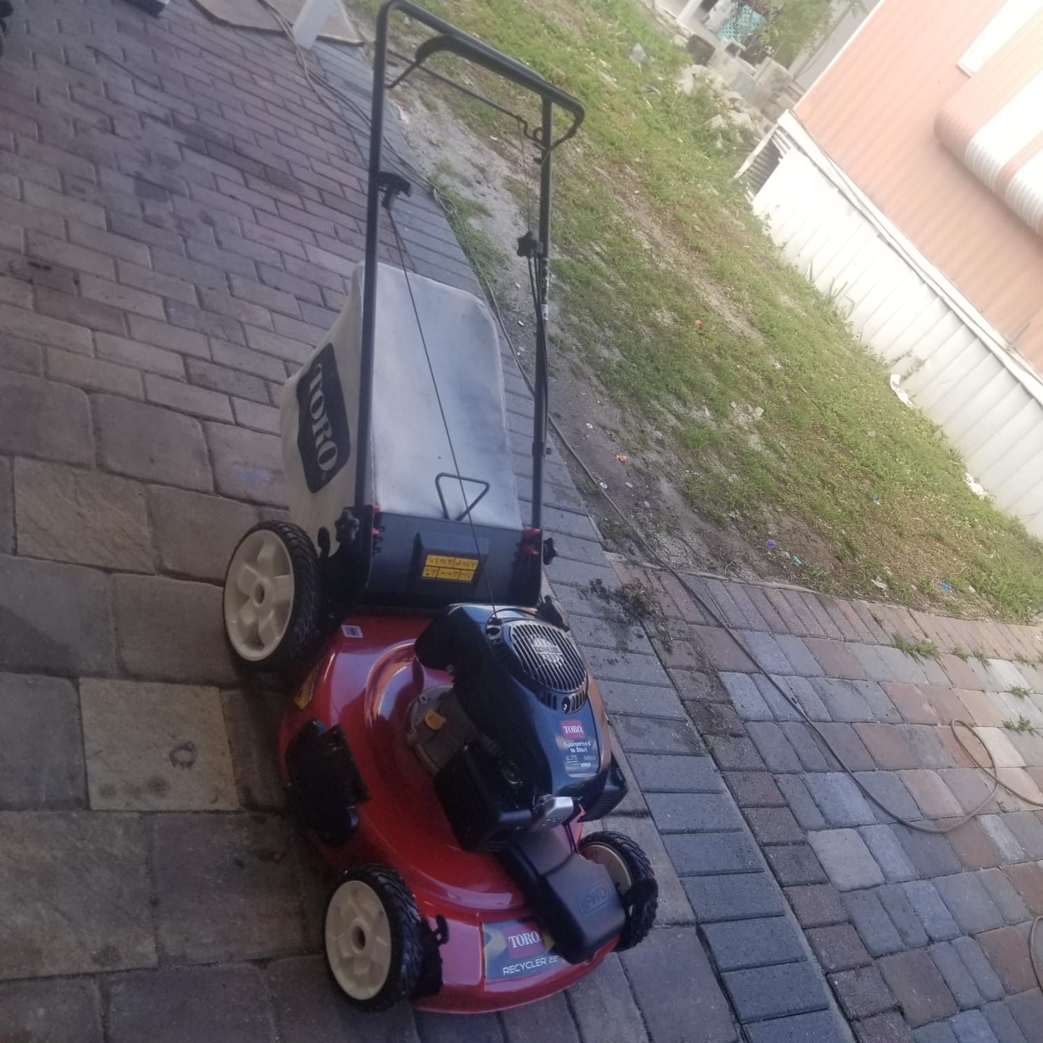 Toro lawn mower almost brand new used 2 times self propelled with bag