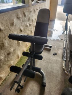 Workout bench complete with leg press and preacher seat