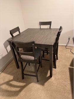 42" table set for 4 (Living Spaces)