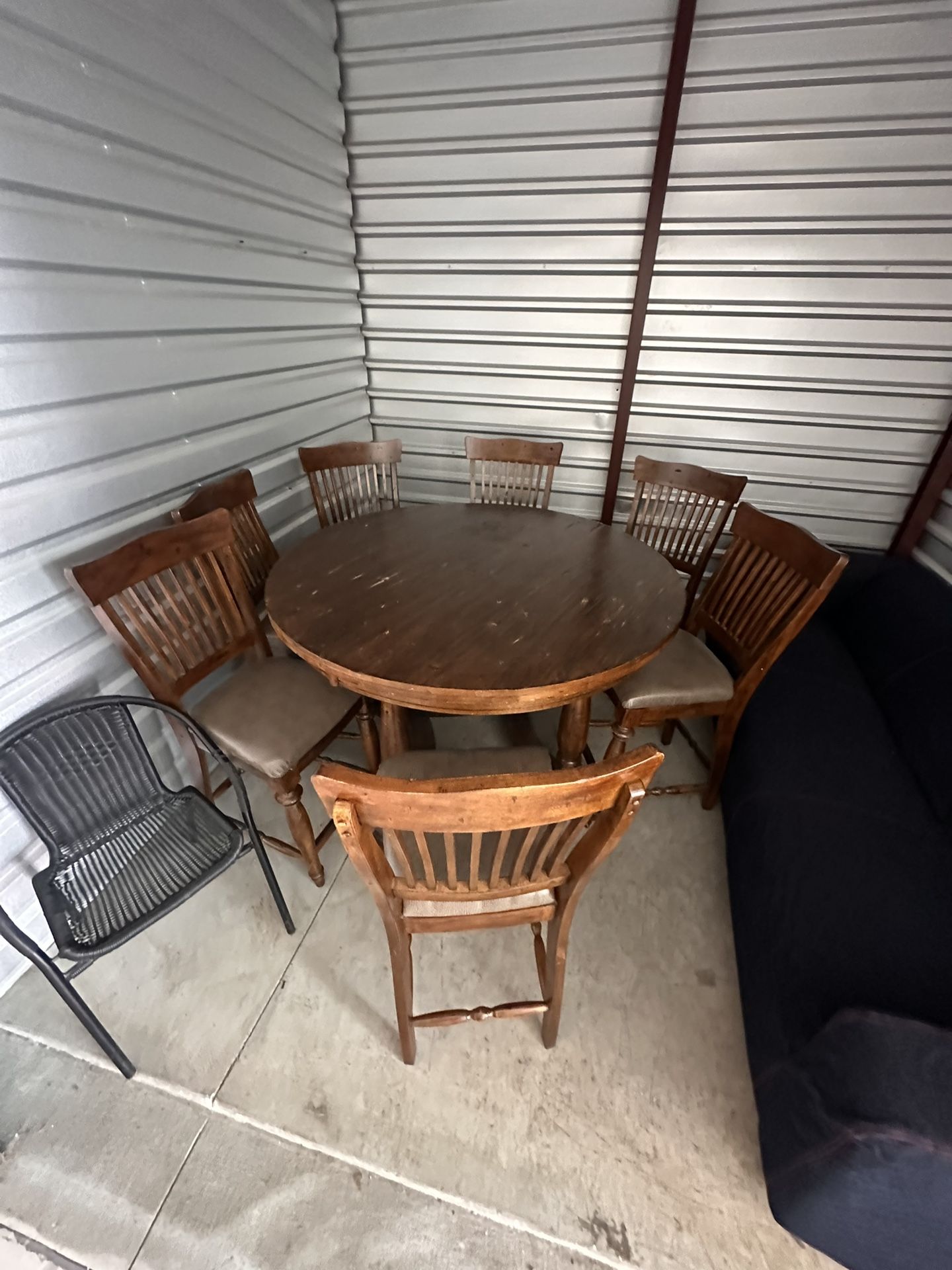 Table top 54”around H36” Very good condition wood table with 7 matching chairs