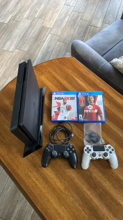 PlayStation 4 Console with 2 controllers