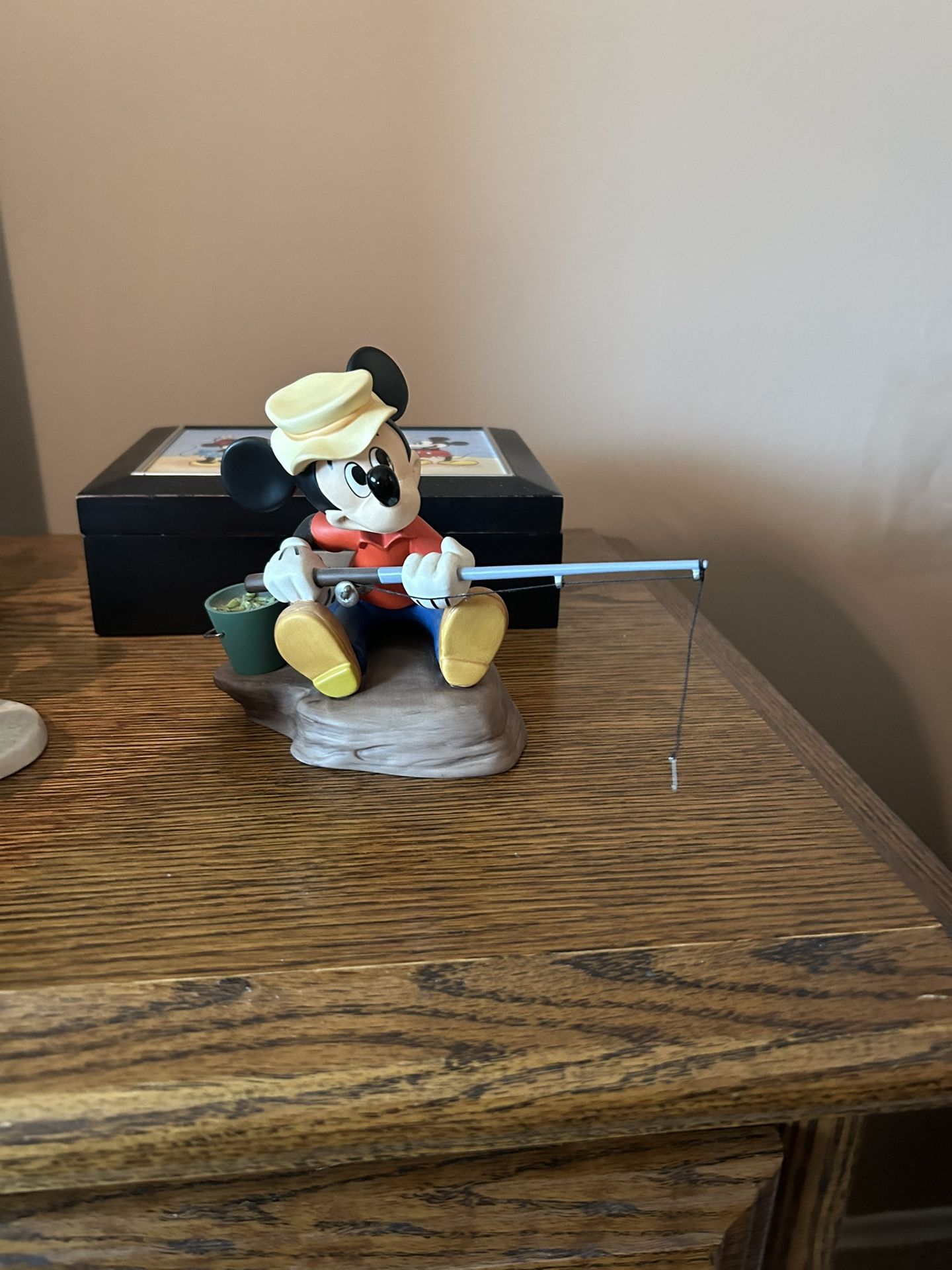 Walt disney mickey fishing statue