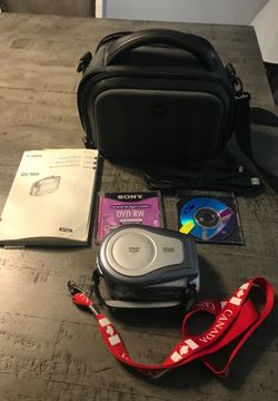 Canon DC 100 manual camera
