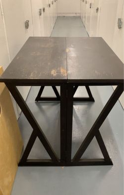 Wooden table with two stools