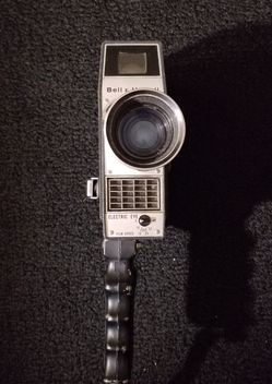 This is a vintage Bell and Howell Electric Eye 8 mm camera in good condition