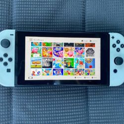 NINTENDO SWITCH V2 (Modded) With Over 7500 GAMES INSTALLED