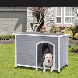 🌟 wooden outdoor Winston dog house, waterproof roof and sits higher for cooler/warmer weather conditions.