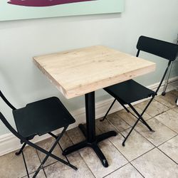 Bistro Kitchen Table With Wooden Top And Two Metal Chairs