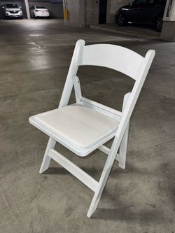 Set of 30 White Resin Folding Chairs with Padded Seats and Rolling Dolly