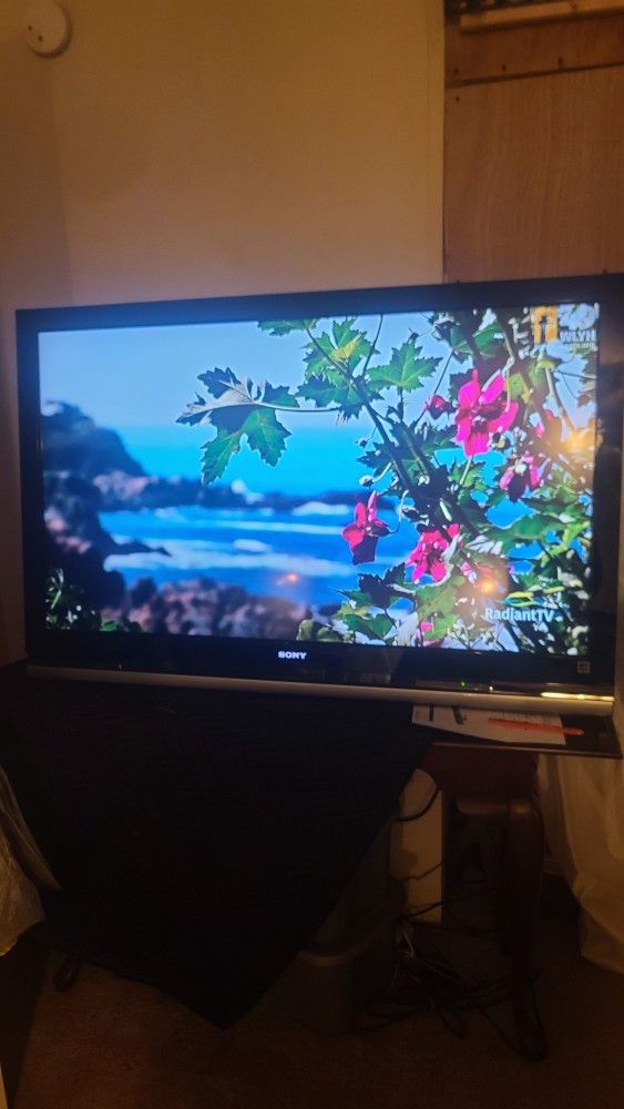 55 inch Sony TV with hanging bracket