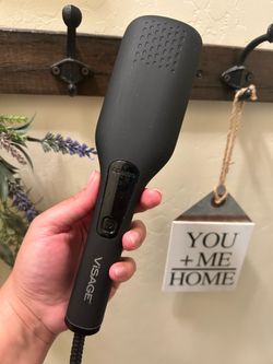 Hair straightening comb