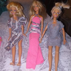 6 Barbies With Homemade Clothes