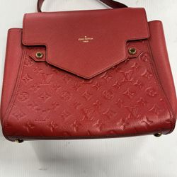 RED LEATHER LOUIS VUITTON MONOGRAM TROCADERO HAND BAG, IN USED CONDITION, NO BOX OR DUSTBAG, ENTRUPY VERIFIED