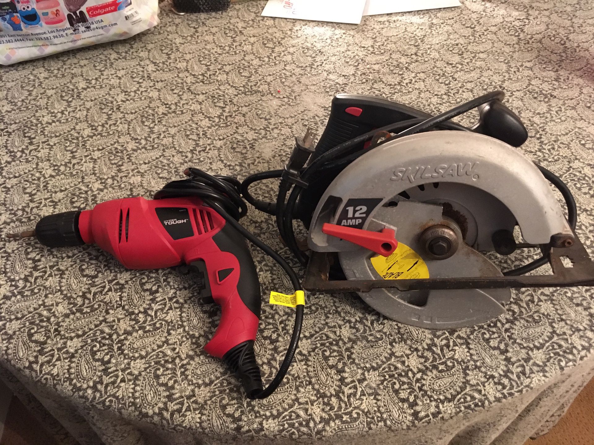 12 amp skilsaw and hyper touch power drill