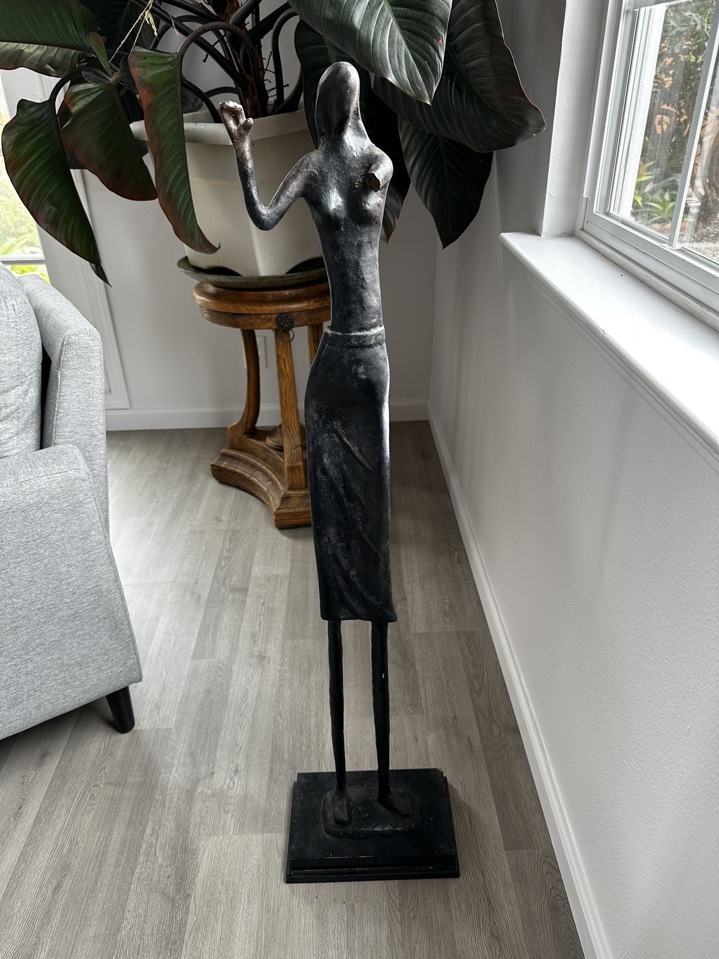 Metal Statue Of Flutist