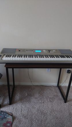 musical piano with its table