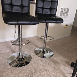 Black leather adjustable barstools