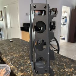New dumbbell rack stand. black metal. 12”W x 16”H. holds 5-15 pound weights  