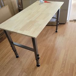 Adjustable Workbench with Power Outlet