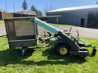 Zero turn riding mower grass catcher