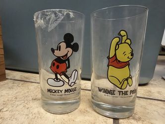 Set of 2 vintage Disney glasses featuring Mickey Mouse and Winnie the Pooh