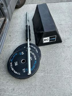 Gym Barbell Bench and Bumper Plates