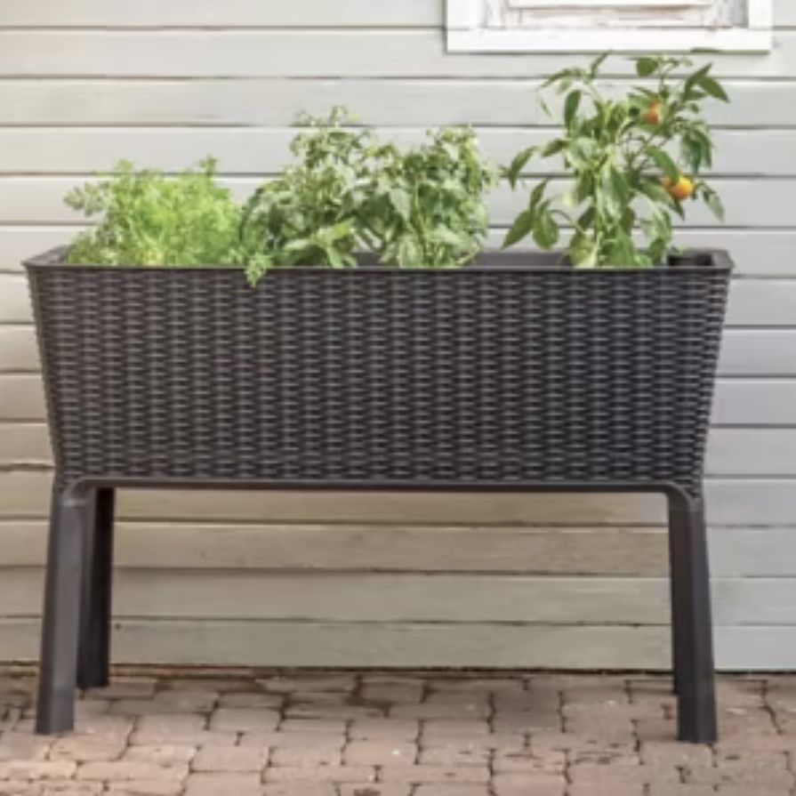 Two Elevated planter boxes and 5 flower pots