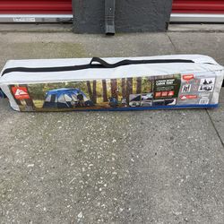 Brand new Ozark Trail 10’ x 9' 6-Person Instant Cabin Tent with LED Lighted Hub, 25 lbs