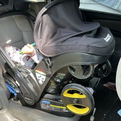 Doona Car Seat Stroller  With The Base