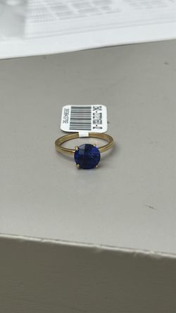 Gold Solitaire Ring with Blue Stone