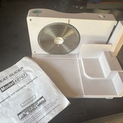 The Harbor Freight Meat Slicer Model 42787 (a compact 6.5" blade slicer)