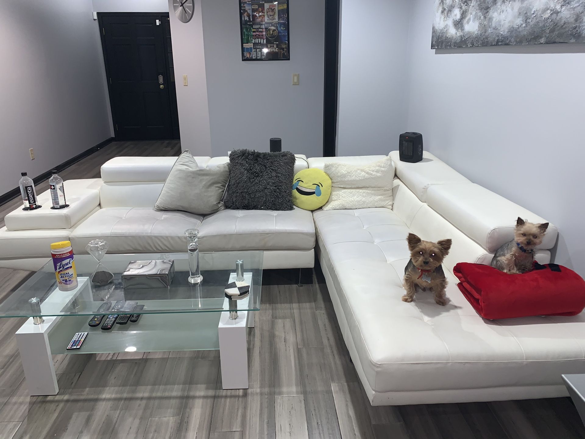 White tufted faux leather sectional couch