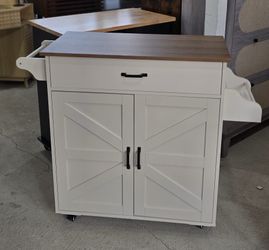 Wooden kitchen Island on wheels. $100