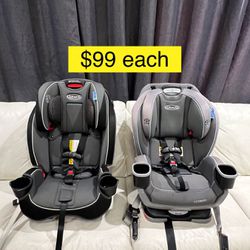 Graco EXTEND 2FIT, SLIMFIT  car seat, double facing, recliner, convertible, all ages $99 Each/ Silla carro bebe a niño