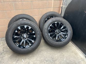 GMC 265/60R18 tires with Rims