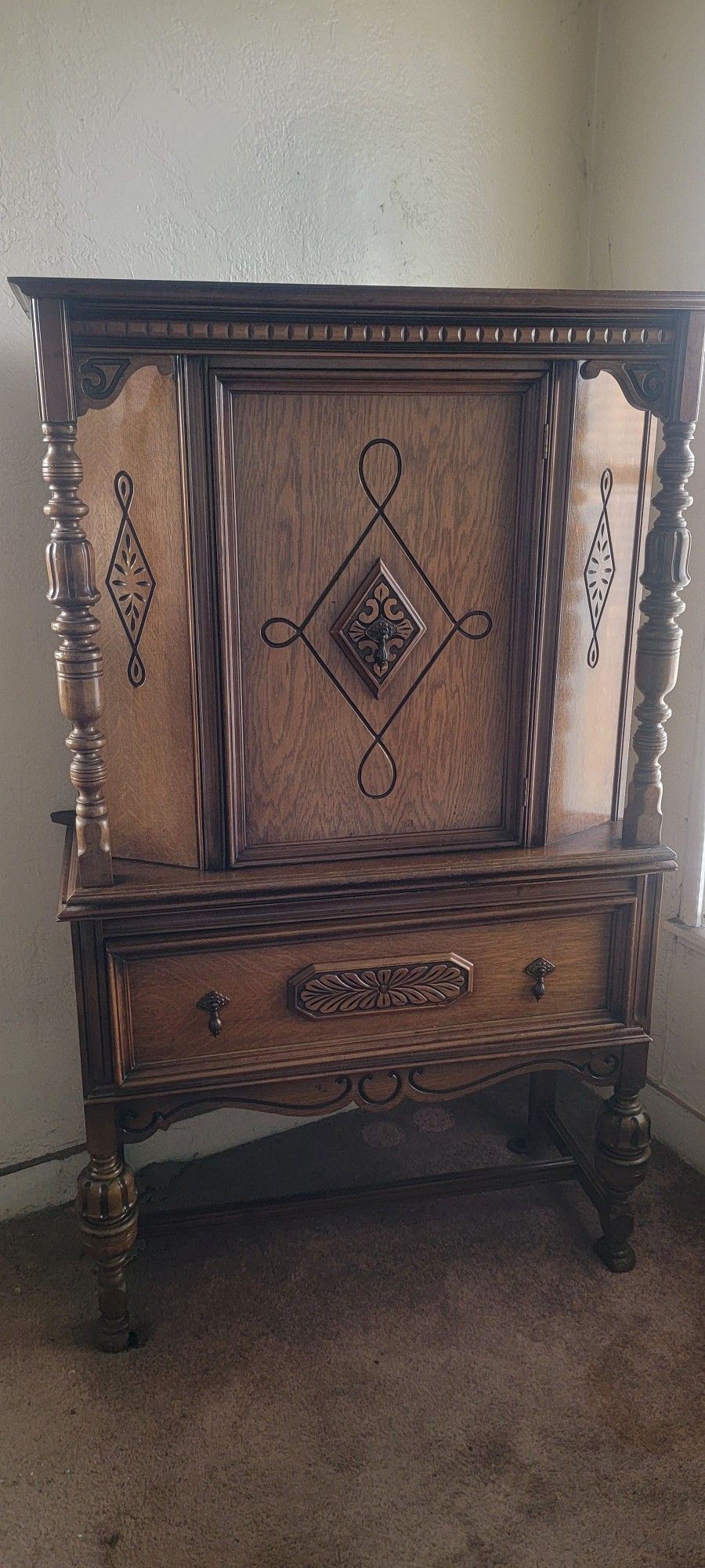 Jacobean style Antique china cabinet